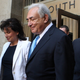 Strauss-Kahn and his wife leaving court (Getty Images)